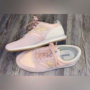 pink woman’s new balance shoes